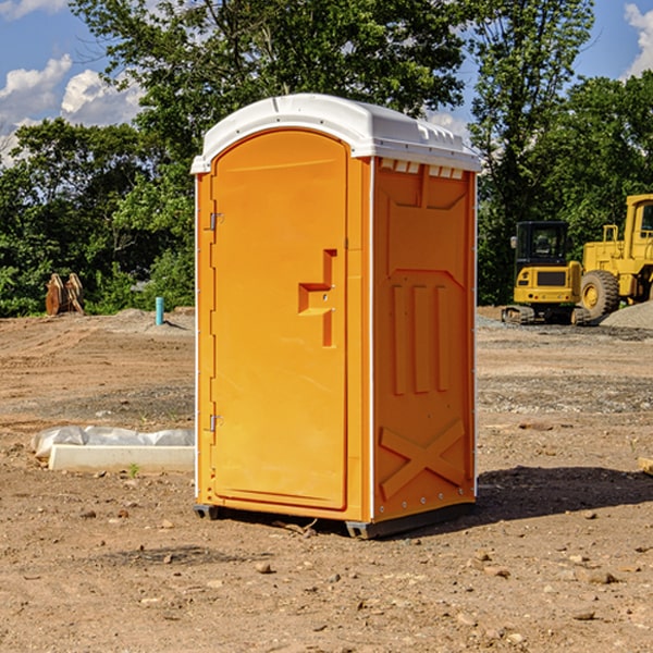 how often are the portable restrooms cleaned and serviced during a rental period in Holcomb